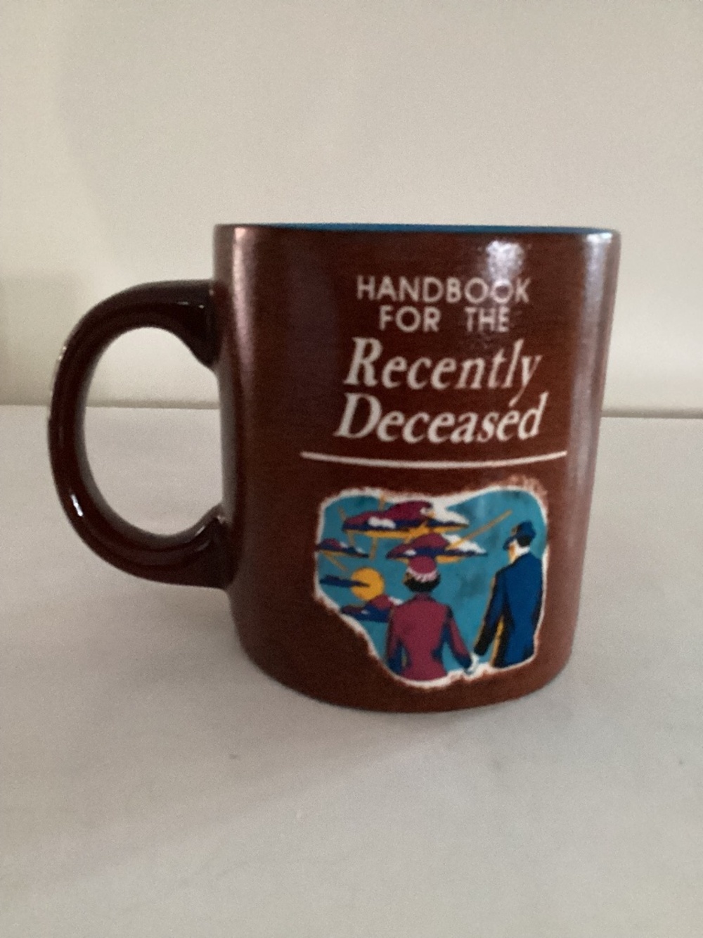 Beetle juice theme “Handbook for the Recently Deceased” mug